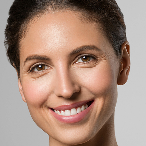 Smiling woman with short brown hair