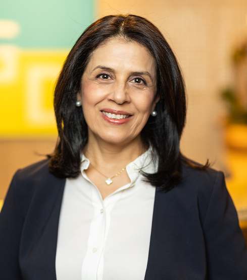 Port Chester dentist Doctor Feryal Alidadi smiling
