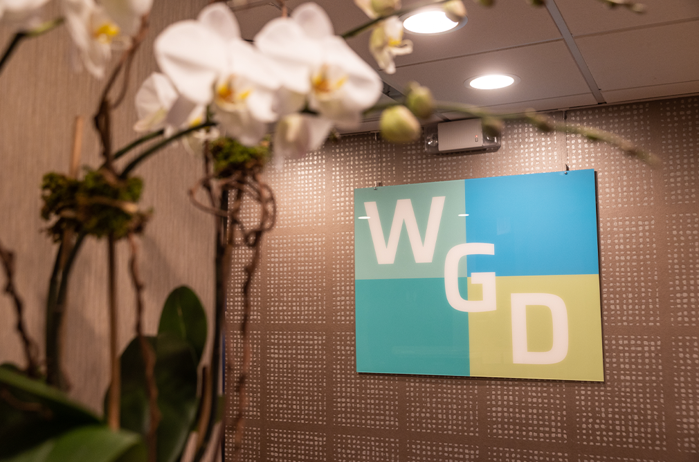 Westchester Gentle Dentistry logo framed on the wall of dental office in Port Chester